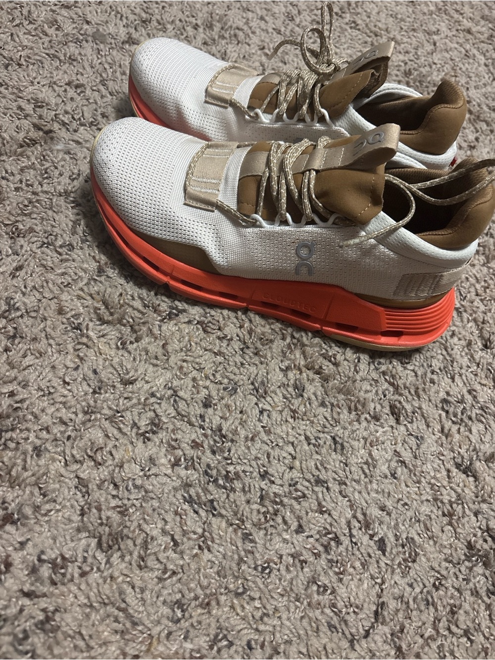 On Running women’s Sneakers in cream with Orange and Brown Accents